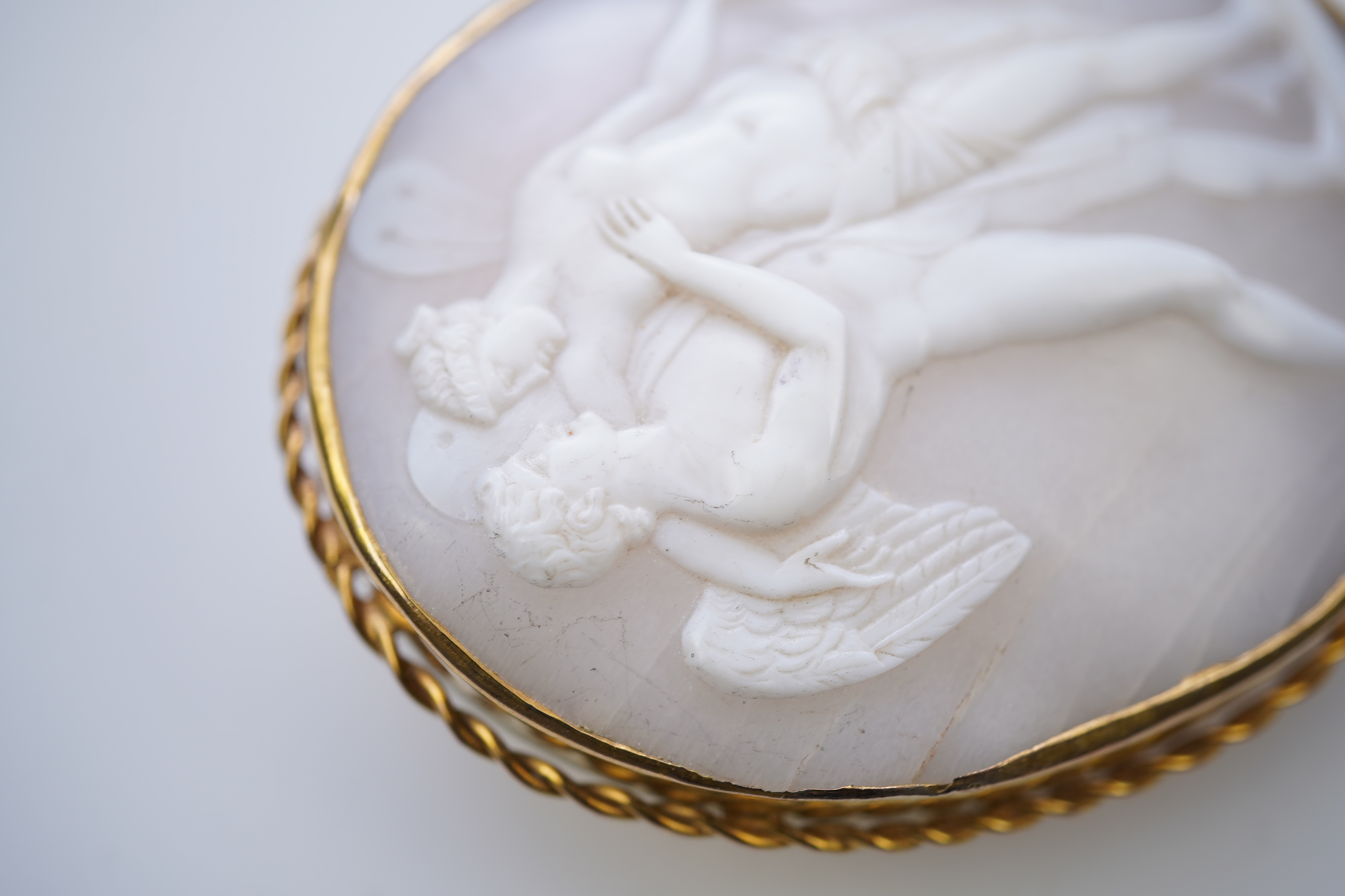 A shell cameo brooch, late 19th/early 20th century